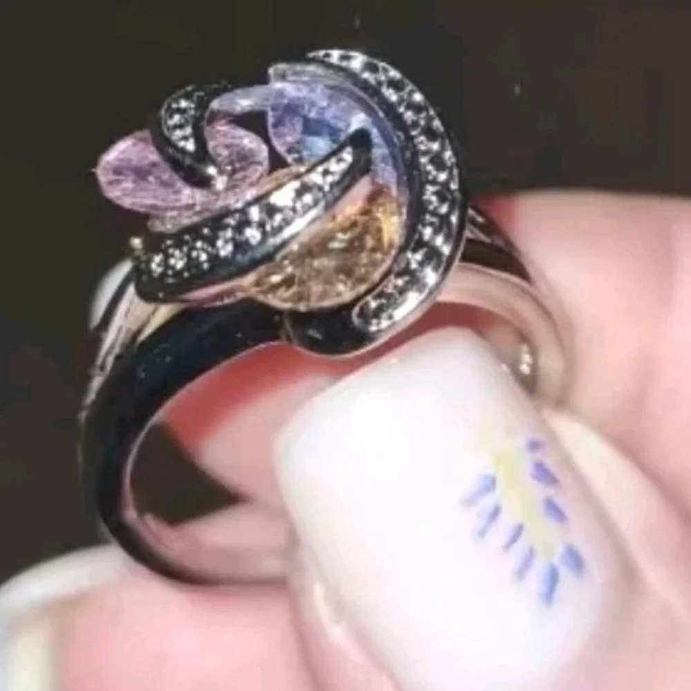 Sparkling Zirconia With Pink,yellow, and Purple Rotating Gemstone Design Sz 8